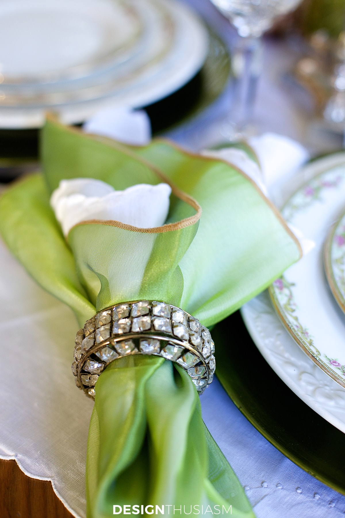 napkin cluster in crystal napkin ring on casual formal mix table