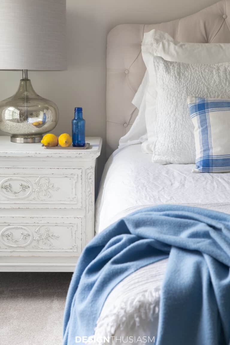 guest room ideas lemons and water on the bedside table